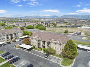 Aerial view of residential area featuring a mountain backdrop