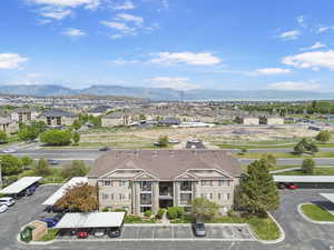 Aerial perspective of suburban area featuring a mountainous background