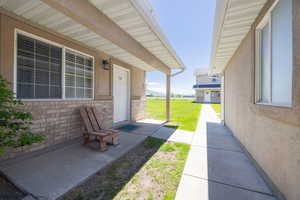 View of patio featuring a porch