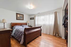 Bedroom with light wood-type flooring