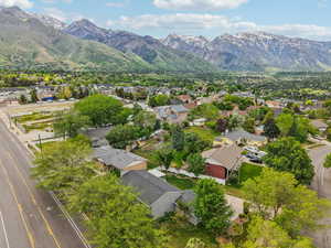 Aerial view of residential area featuring mountains