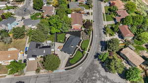 Aerial overview of property's location featuring nearby suburban area