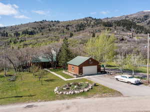 View of subject property with a mountainous background