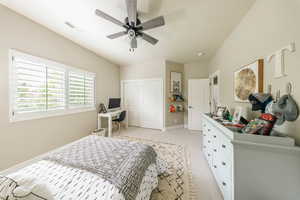 Bedroom with light wood-style flooring, baseboards, and a ceiling fan