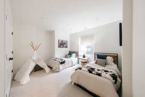 Bedroom featuring carpet flooring