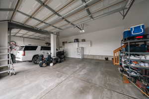 Garage featuring a garage door opener