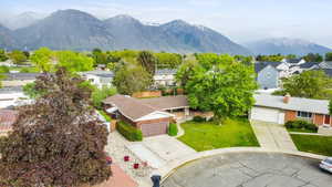 Aerial view of residential area with a mountainous background