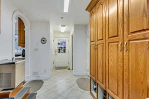 Bathroom featuring tile patterned flooring and baseboards