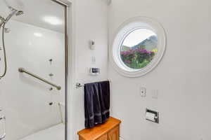 Full bathroom with a stall shower