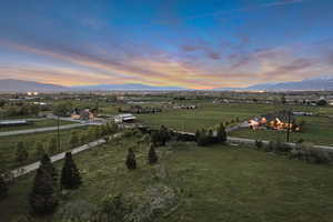 View of mountain background featuring rural landscape