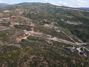 Aerial overview of property's location featuring mountains and rural landscape