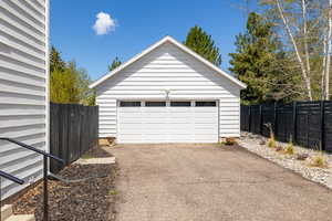 Detached garage with fence