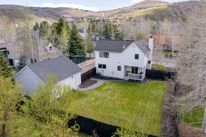 View of subject property featuring a mountain backdrop