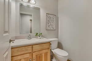 Bathroom with vanity and toilet