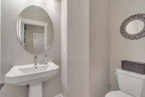 Bathroom with toilet and a sink