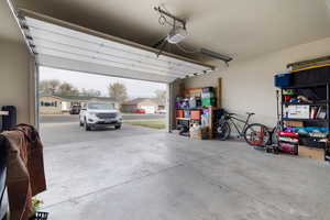 Garage featuring a garage door opener