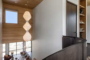 Detailed view of recessed lighting and wooden ceiling
