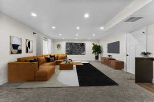 Downstairs living room staged with AI.