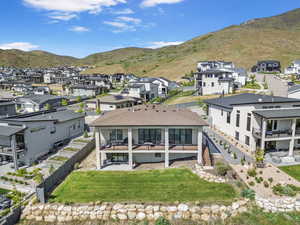 Aerial perspective of suburban area with mountains