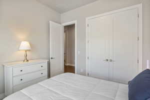 Bedroom with a closet and baseboards