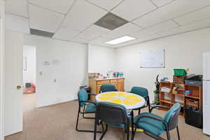 Office area with carpet flooring