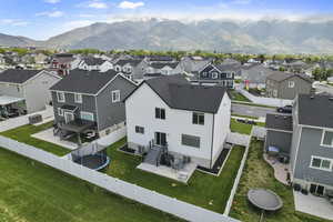 Aerial view of residential area with a mountain backdrop