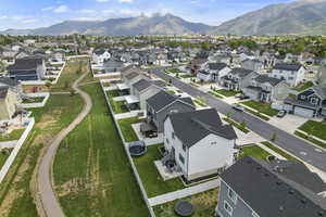 Aerial view of residential area featuring a mountain backdrop