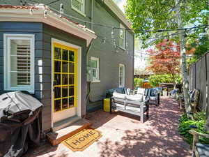 View of patio / terrace featuring an outdoor hangout area, fence, and grilling area