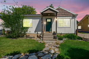 View of front of home with board and batten siding