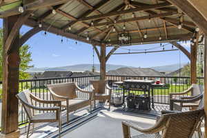 View of patio / terrace featuring a gazebo and a mountain view