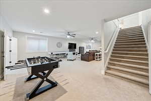 Playroom featuring recessed lighting, carpet, and a ceiling fan