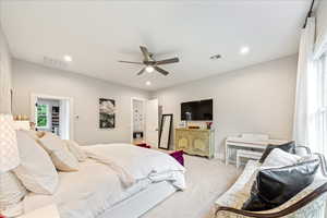 Bedroom with light carpet, baseboards, a ceiling fan, and recessed lighting