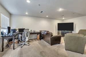 Office space with carpet floors, recessed lighting, and baseboards