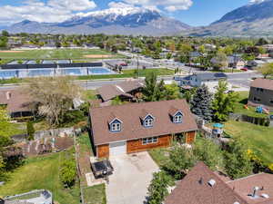 Aerial view of residential area featuring a mountain backdrop