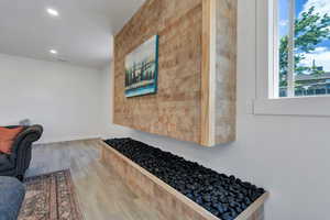 Office area with recessed lighting, wood finished floors, and baseboards