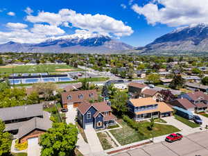 Aerial view of residential area featuring mountains