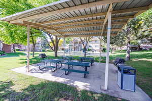 View of property's community with a patio area
