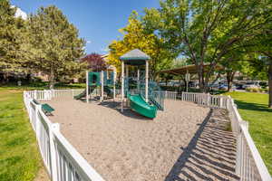 Community playground with a lawn