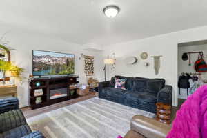 Living area with wood finished floors