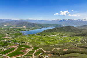 View of mountain backdrop with a large body of water