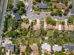 Aerial view of property's location featuring nearby suburban area