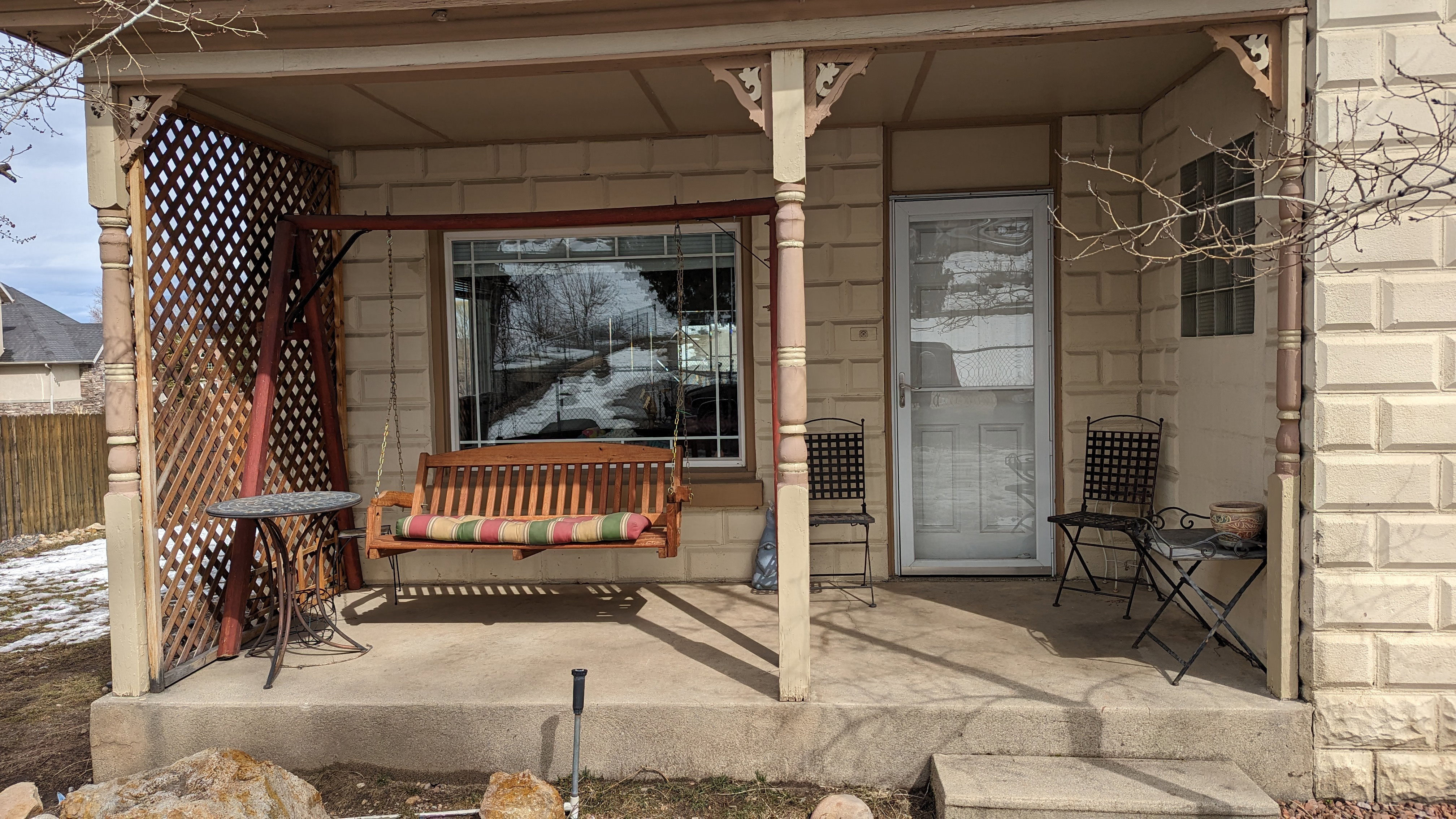 View of patio / terrace featuring a porch and fence