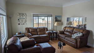 Living area with wood finished floors