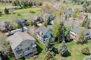 Aerial view of residential area with a local golf course