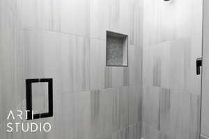 Bathroom view of tiled shower