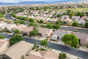 Aerial view of residential area featuring a mountain backdrop