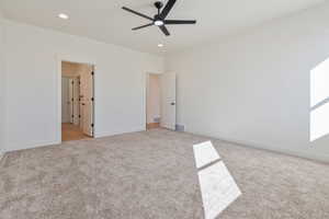 Unfurnished bedroom with carpet flooring, baseboards, recessed lighting, and a ceiling fan