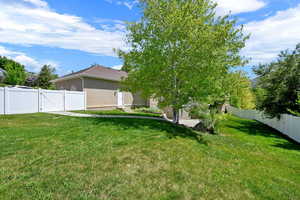 View of yard featuring a gate and entry steps