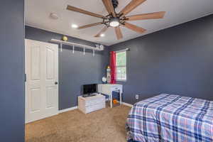 Bedroom with carpet flooring, baseboards, a ceiling fan, and recessed lighting