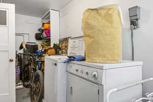 Laundry area featuring separate washer and dryer